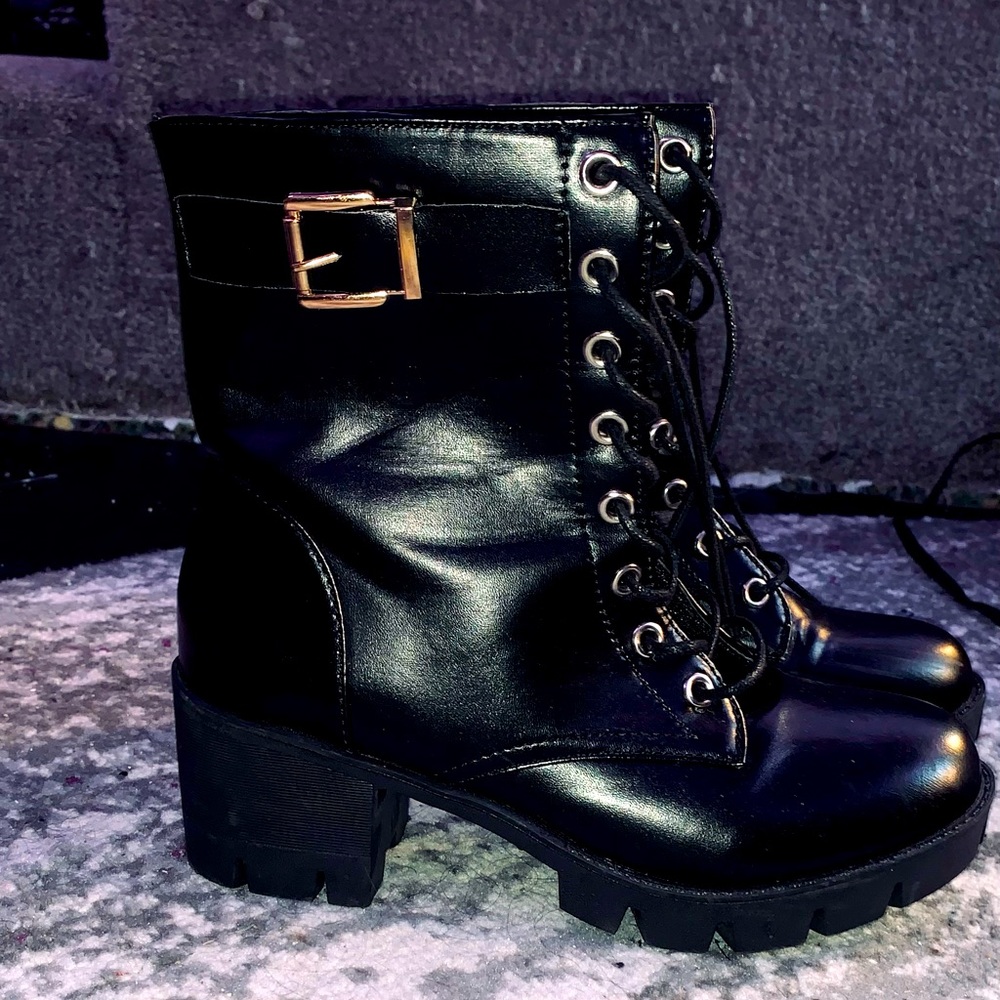 Black heeled combat boots